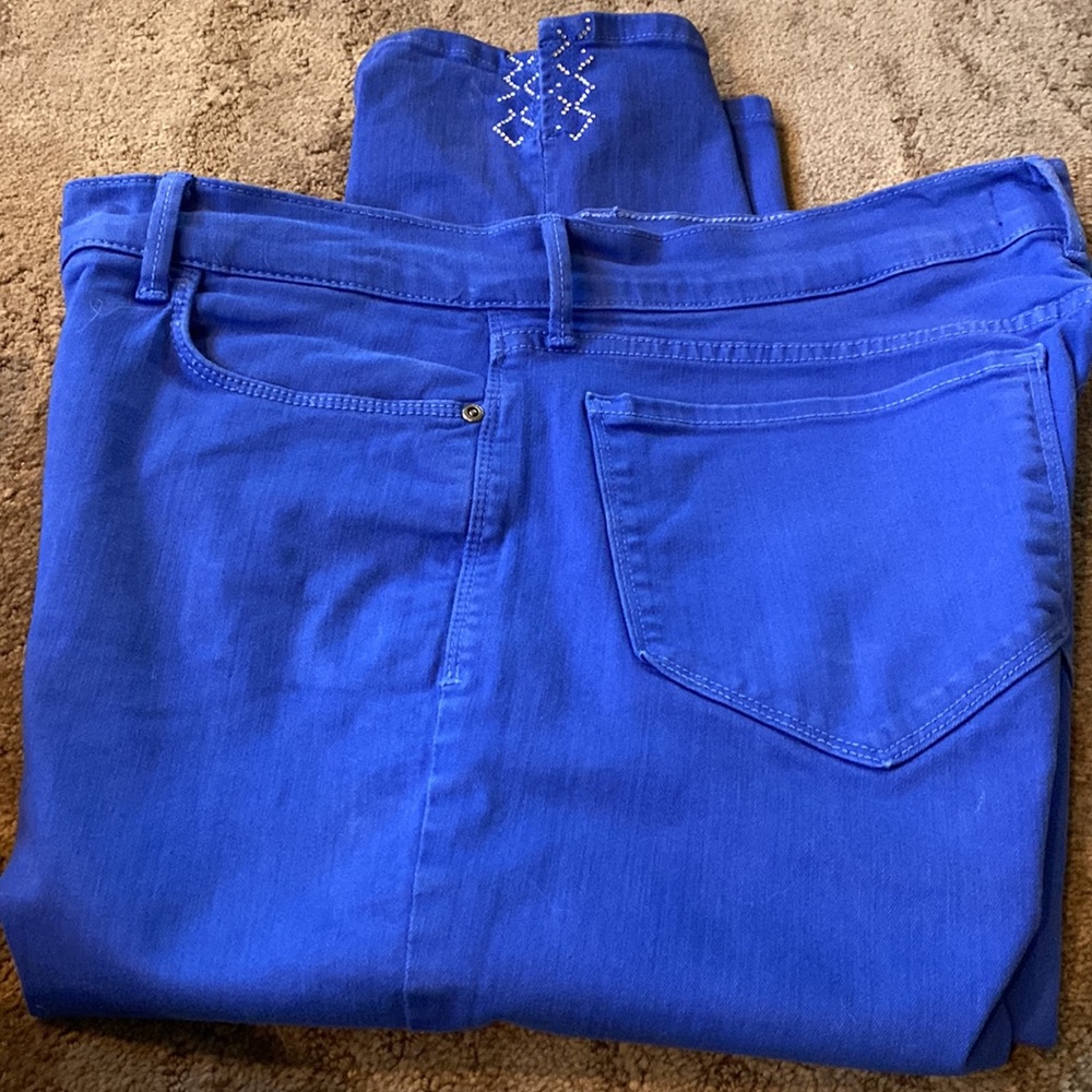NYDJ cropped bright blue with embellishment at split hem.